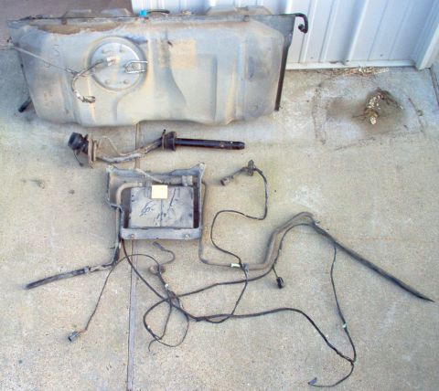 1994 Ford Crown Victoria - I pulled this from a '98 P71. It was nearly full of gas, so I figured it would be fairly clean inside. I was wrong. But I did get all the e…