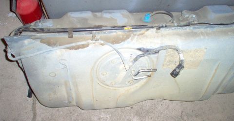 1994 Ford Crown Victoria - The gray Fuel Tank Pressure sensor comes out with a 1/4 CCW turn. Its connector is part of the fuel pump assembly. The blue vapor valve pry…
