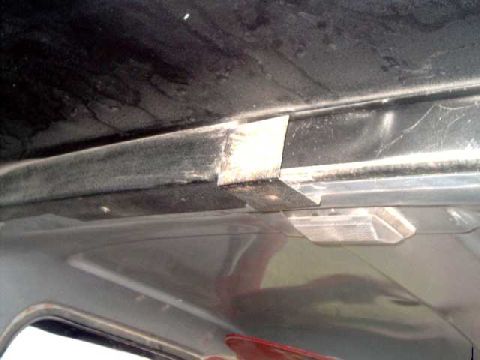 1986 Ford Bronco - two top trim sections mount to cab/roof with screws.
