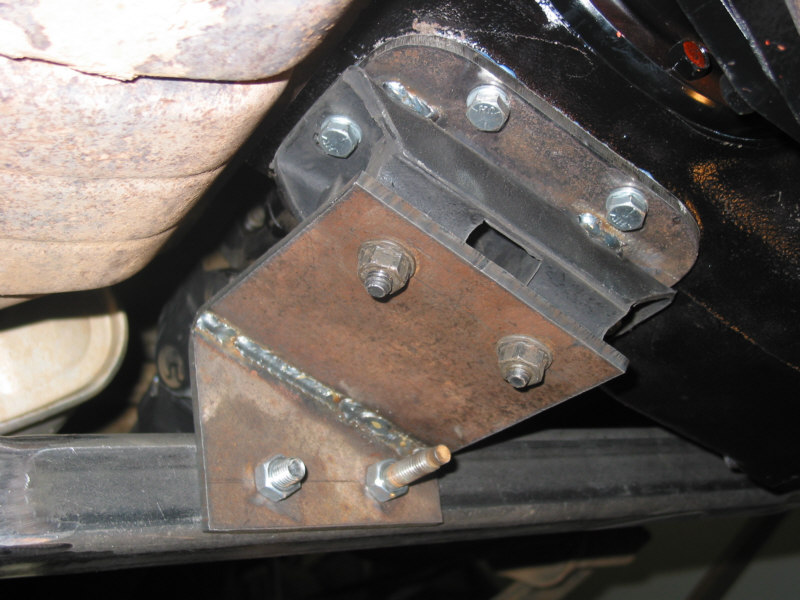 Mount for NP205. The tranny mount is welded to the new 1/4 inch access cover, then the cover is attached with longer bolts.