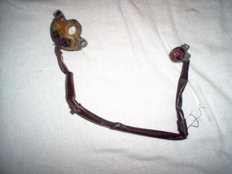 1988 Ford Bronco - This image shows an electrical connector and a portion of a wiring harness, likely a replacement part.