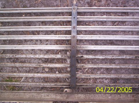 1985 Ford Bronco - A close-up view of a metal grille, possibly from a vehicle, with a visible date stamp of 04/22/2005.
