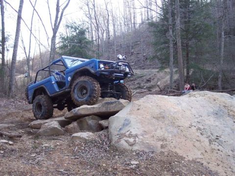 1974 Ford Bronco - This 1974 Ford Bronco is navigating a challenging rocky terrain during an off-road adventure.