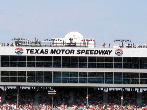 2000 Ford Crown Victoria - Exterior view of the Texas Motor Speedway building with text and logos visible.