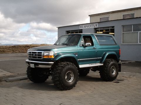 1996 Ford Bronco - This lifted 1996 Ford Bronco features massive off-road tires, giving it an imposing stance.