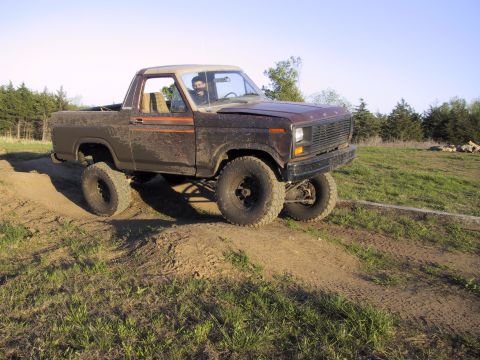 1983 Ford Bronco - This lifted 1980 Ford Bronco navigates an off-road course, its capabilities.