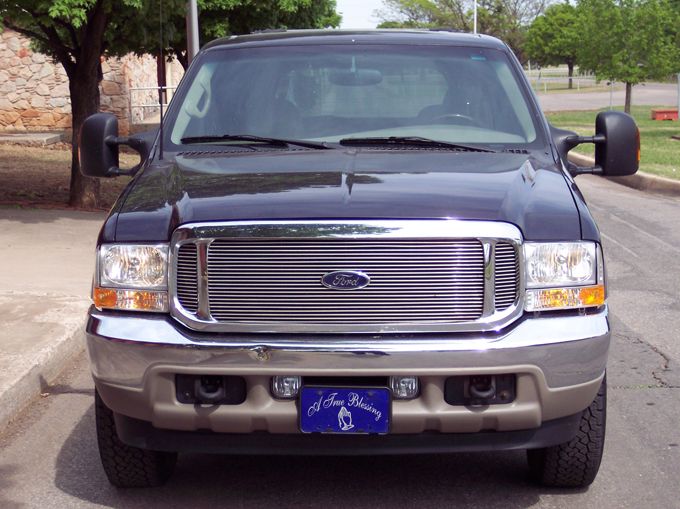 The new front end look With Foglamps . Please ignor the dent on the bumper :) It came like that when I bought it....hee...hee...hee...