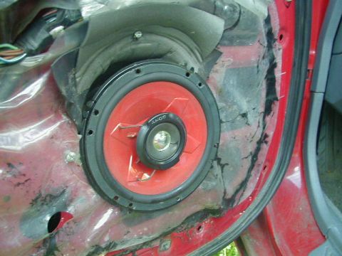 1993 Ford Probe - Close-up of a car door interior showing a Sony speaker.