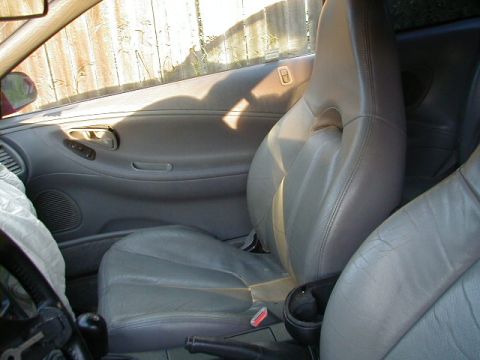 1993 Ford Probe - Interior view of a car, focusing on the seats and door panel.
