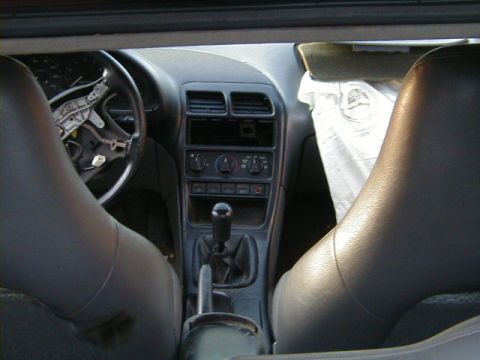 1993 Ford Probe - Interior view of a 1993 Ford Probe, highlighting the dashboard and driver's side components.
