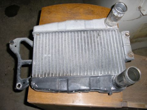 1990 Ford Probe - A close-up view of a radiator part, likely for a vehicle.