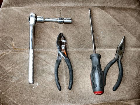 1990 Ford Bronco - These are the tools you'll need: - A socket wrench with an 11mm socket - Pliers and/or Needlenose pliers - Flathead screwdriver