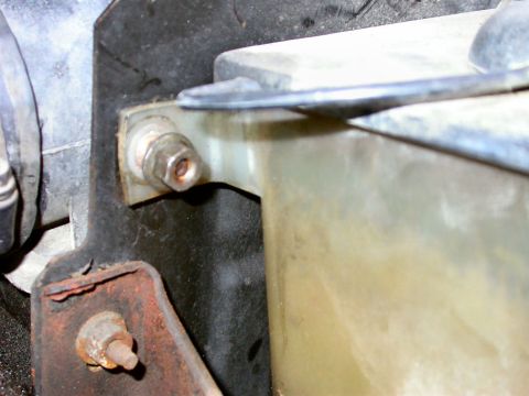 1990 Ford Bronco - Take out this nut and don't lose it. (I haven't been able to find more at Home Depot that have the washer built in.)