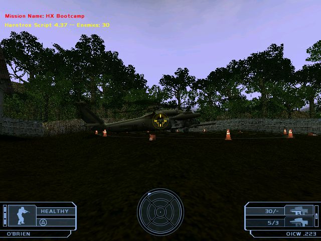 game screenshot showing a downed helicopter in a jungle clearing, with mission info and HUD elements visible