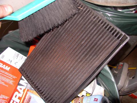 1986 Ford Bronco - Brush all the loose leaves, dirt and bug brains off the filter first.