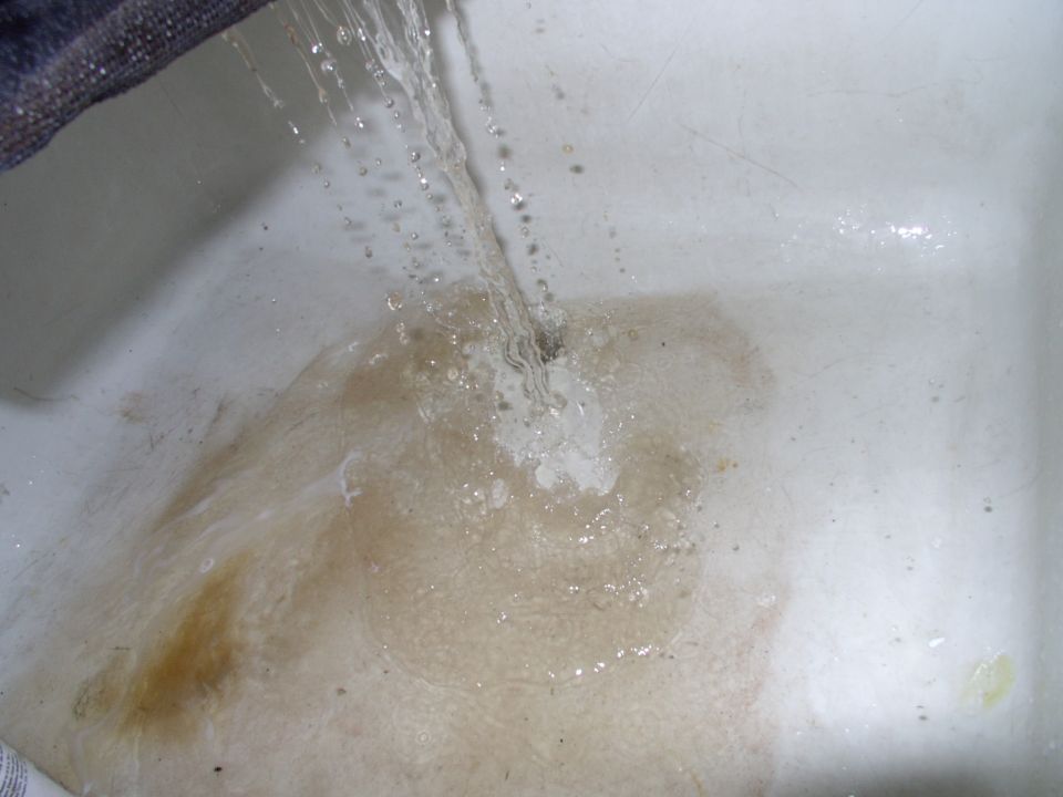 Damned slow digital cameras! Trust me, the water was even dirtier than you're seeing now.