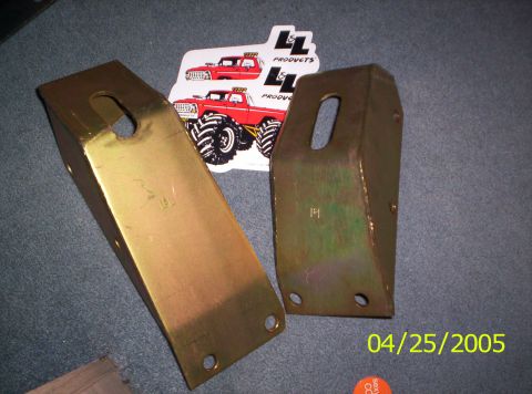 1985 Ford Bronco - Two metal brackets and two monster truck stickers are shown, with a date stamp of 04/25/2005.
