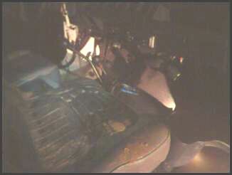 1995 Ford Bronco - Close-up view of an engine bay, with the SuperMotors logo visible.