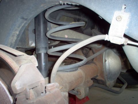 1994 Ford Crown Victoria - The suspension looks pretty cramped already, but a tailpipe is going in there.