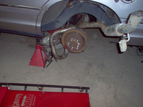 1994 Ford Crown Victoria - It fit in easier than I expected: set it like this, and then rotate CW so the loop drops over the axle.