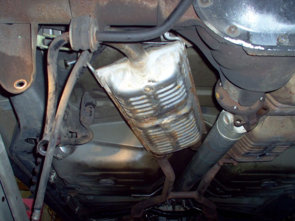 The junkyard had removed the R muffler, and apparently, this one was bent while the car was being moved around the yard.