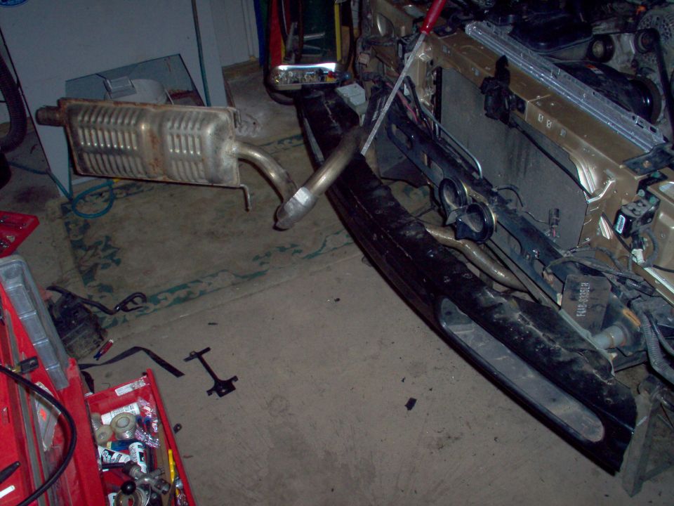 With the front bumper skin off, I found the perfect spot to work on the tailpipe.