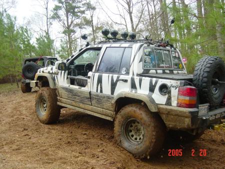 1993 Jeep Grand Cherokee - This modified 1993 Jeep Grand Cherokee is equipped for off-road adventures, with a distinctive zebra stripe paint job.