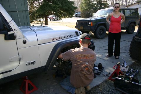 2003 Jeep TJ - Working on a 2003 Jeep TJ Rubicon, with a Jeep Cherokee parked nearby.