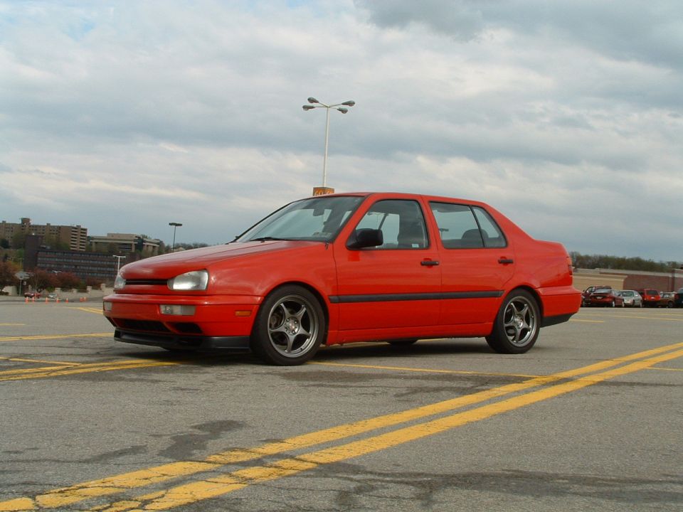 Red 1994 Volkswagen Jetta sedan, 3/4 front view