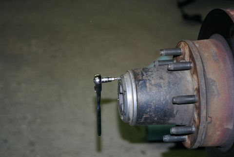 1996 Ford Bronco - What do do when you strip the hex heads in your lockout hubs? Pound in a T-20 Torx driver and use your 1/4" ratchet of course.
