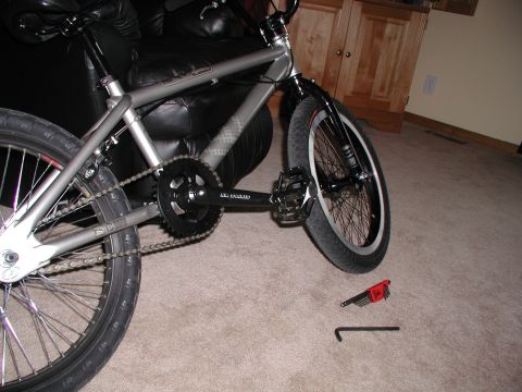 1998 Jeep TJ - A bicycle's frame, crankset, and chain are visible, along with a set of Allen wrenches on the carpet.