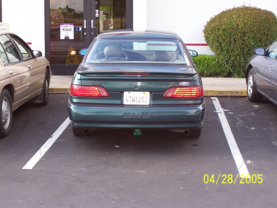 Rear of a 1998 Mercury Sable with a trailer hitch ball