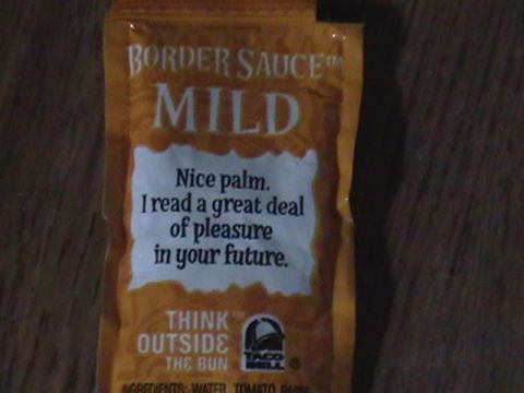 1986 Ford Bronco - A Taco Bell mild border sauce packet features a fortune reading, "Nice palm. I read a great deal of pleasure in your future."