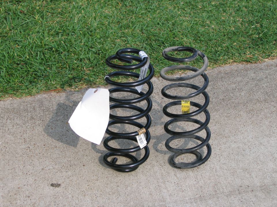 Left: P71 "HH" spring. Right: Stock spring.