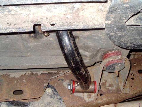 1984 Ford Bronco - A-pillar cage-frame mount attached to frame. The bracket for the extended radius arm interefered with a straight mount, so I used the body…