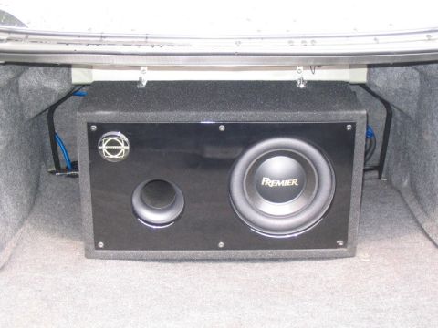 1999 Ford Taurus - 10" Premier sub, ported box, bolted to body to prevent sliding around... LOL.. very loud, very tight... very nice massager when I crank it.…