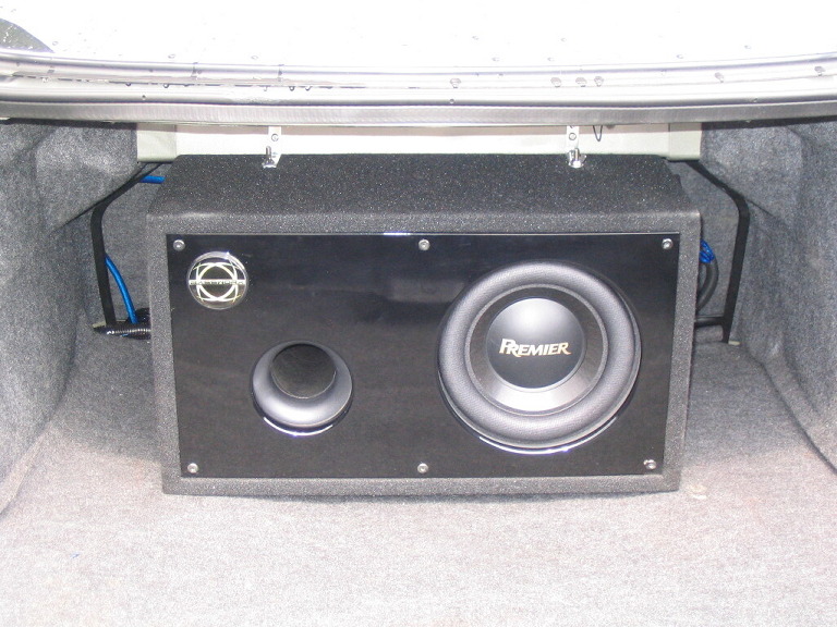 10" Premier sub, ported box, bolted to body to prevent sliding around... LOL.. very loud, very tight... very nice massager when I crank it...  :)