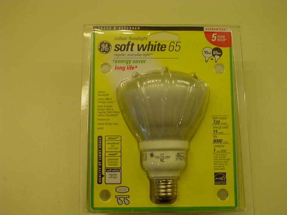 Here is a Compact Fluorescent Flood Light with the output = to 65Watts but I feel its closer to 75 or maybe even 100 watts.  These bulbs require about 30 seconds or so to warm up before the full output is achieved.