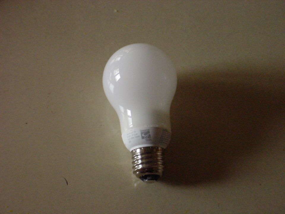 Here is a more standard looking compact fluorescent bulb, it puts out about 40 watts of light  and only uses maybe 12-13 watts of electricity