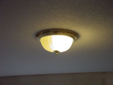 1998 Ford Crown Victoria - This is a standard incandescent light bulb fixture that I put two 60 watt CF spiral bulbs in. A few months later one of the bulbs failed an…