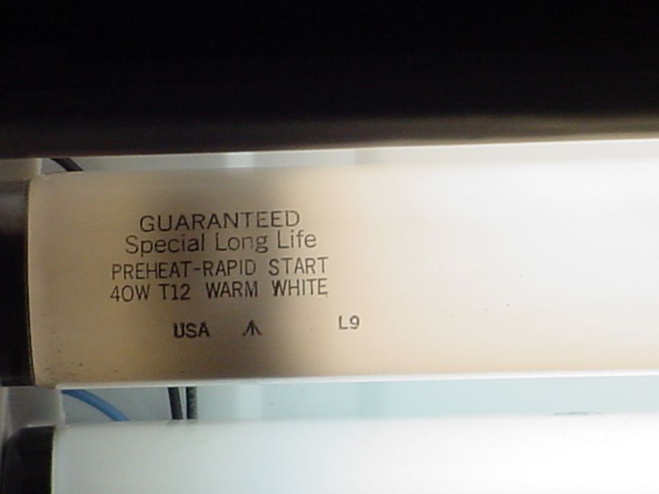 Here is a picture of one of those Warm White T-12 Bulbs.  Guarenteed Long Life indeed!  It's been in this fixture which has seen alot of use since the late 80s!