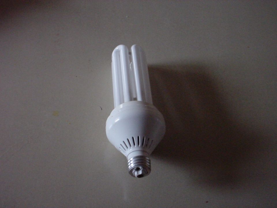 This CF bulb is rather large and puts out about 150-175 watts of light but uses only 45 watts of electricty.  This one DOES get hot though so it can not be used in an enclosed fixture, it is suitable for table lamps.