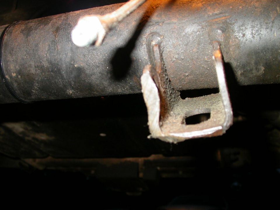 Found this bashed in shock mount while remounting my rear axle after regearing.   The mount sticks down 2 5/8" below the axle tube, looks like it makes a nice rock anchor.  I'm looking into clocking the axle mounts so as to not let them hang down like that.