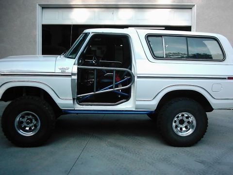 1978 Ford Bronco - This 1978 Ford Bronco features a custom roll cage and removable tube doors for off-road adventures.