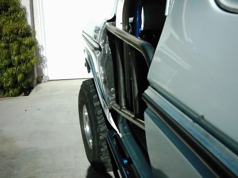 1978 Ford Bronco - This vehicle has a roll cage and tube doors, suggesting off-road modifications.