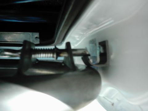1978 Ford Bronco - Close-up of the door latch mechanism on a 1978 Ford Bronco, showing internal components.