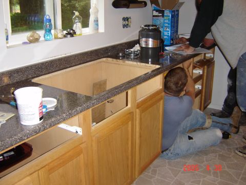 1993 Ford Bronco - Kitchen renovation in progress, showing cabinet installation and sink area.