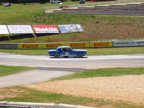 1965 Ford Mustang - Completing 10A at Road Atlanta and setting up for 10B. May 1, 2005 at the 28th annual Walter Mitty Challenge.