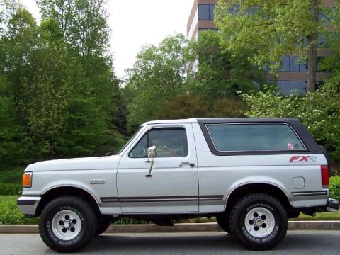 1988 Ford Bronco - This 1988 Ford Bronco is seen from the side, its FX4 badging and black removable top.