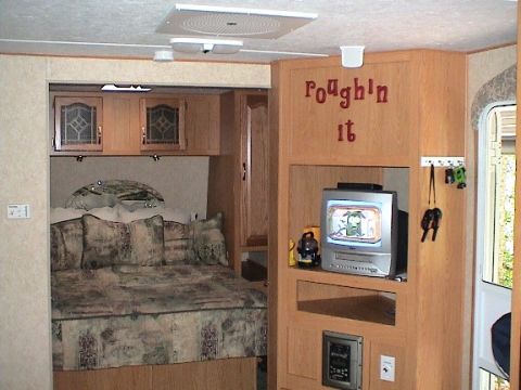 2004 Ford Excursion - 'Roughin It!' View of Master Bedroom and entertainment center